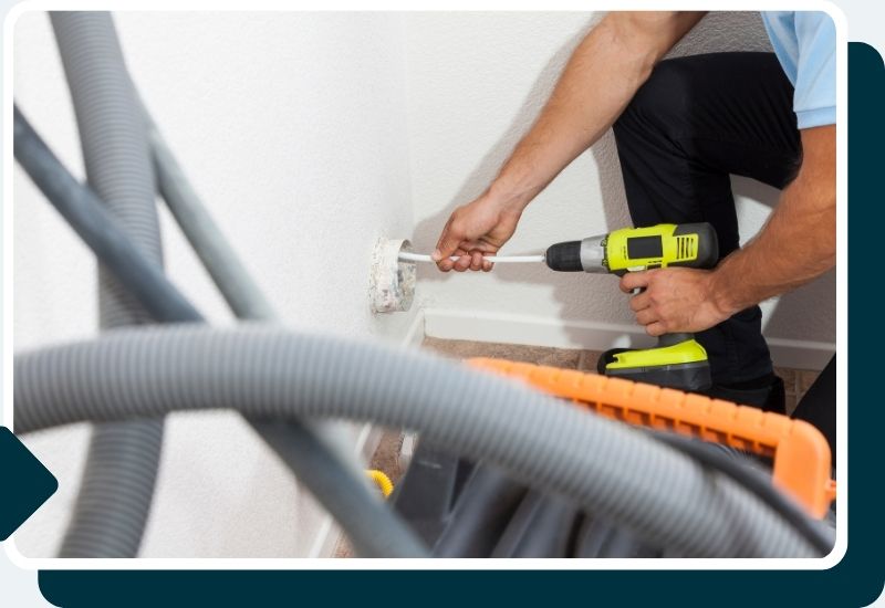 man cleaning dryer vent
